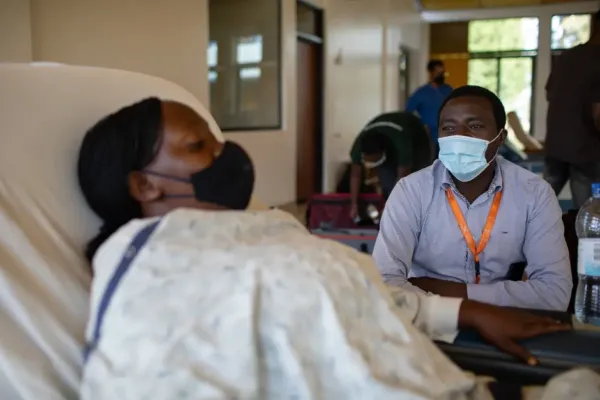 Patient speaks to Oncology Program Manager in Rwanda