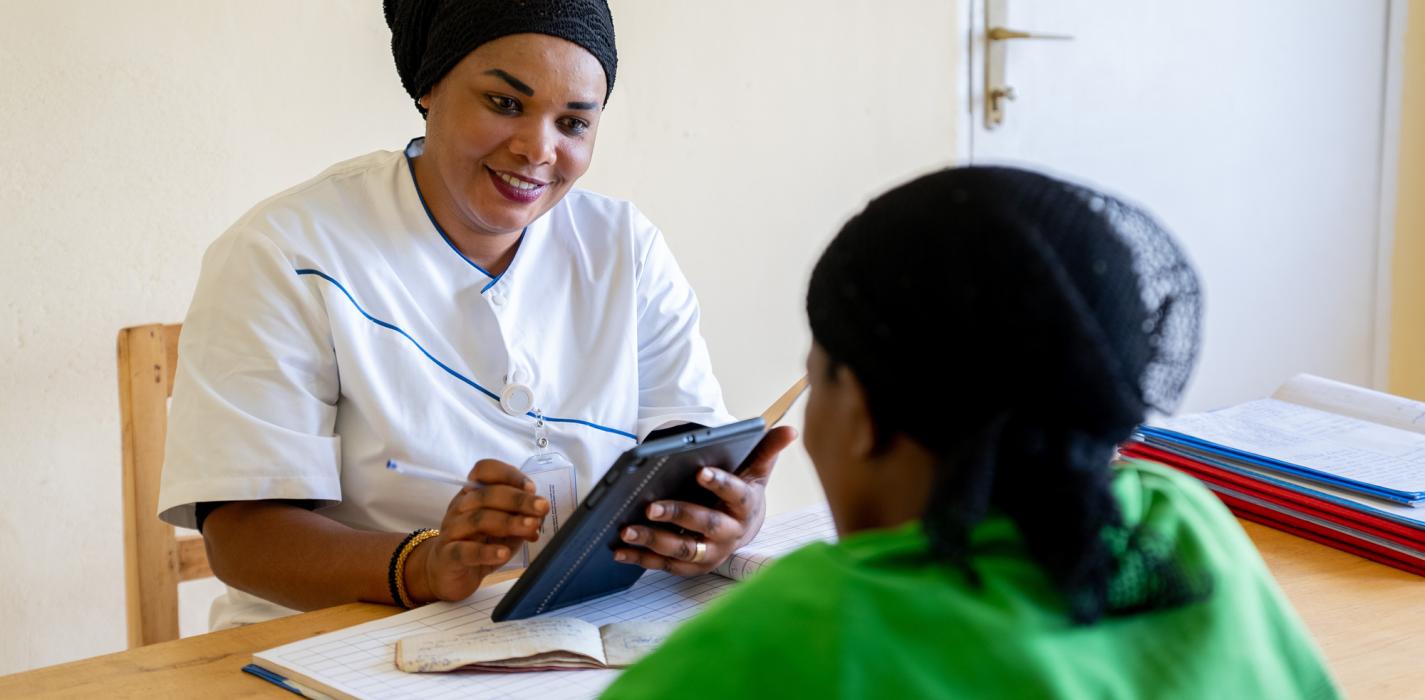 Doctor with patient Rwanda