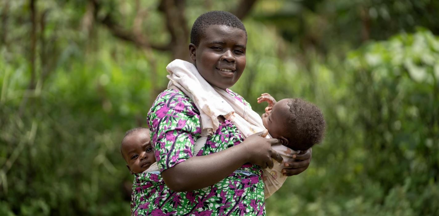Mother holding babies in Rwanda