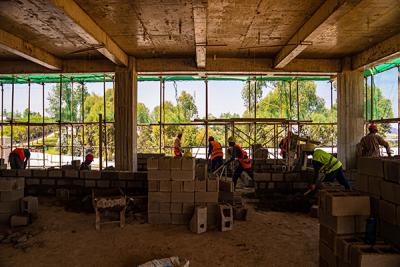 Workers on the Butaro Hospital expansion project are hired locally.