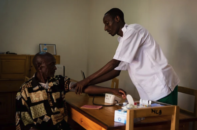 Kirehe District, Rwanda. Doctor providing care.
